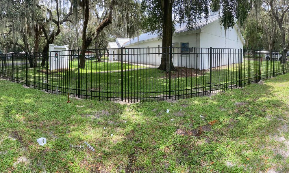 6ft black aluminum fence around commercial building