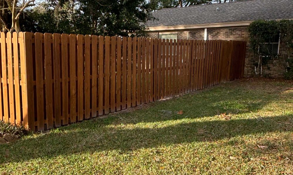 freshly washed 6ft shadow box residential privacy fence with gate